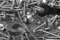 Metal screws, screwdriver bits and wrenches