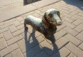 The metal sculpture of the dog