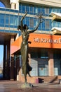 Metal sculpture featuring a dancing girl in Astana