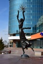 Metal sculpture featuring a dancing girl in Astana