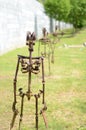 Metal sculpture of human figures marching in line