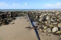 Sewer outfall pipe on Welsh beach Royalty Free Stock Photo