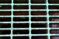 Metal sewer grate for the collection of water Royalty Free Stock Photo