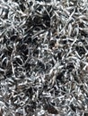 Metal shavings close up. Metal shavings background. Royalty Free Stock Photo