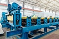 Metal sheet profiling factory. New modern roll forming machine Royalty Free Stock Photo