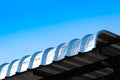 Metal sheet roof curve on blue sky,Modern construction Royalty Free Stock Photo