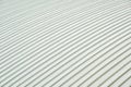 Metal sheet roof curve building. Orderly pattern of roofing metalsheet, large buildings Royalty Free Stock Photo