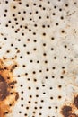 Metal sheet texture with holes and rust Royalty Free Stock Photo