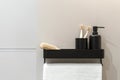 Metal shelf for brush, toothbrush and soap dispenser Royalty Free Stock Photo