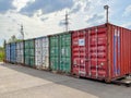 Metal shipping containers are used as a warehouse for goods or personal belongings.