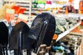 A metal shovel on a shop window. Trade in working tools for gardeners. Foreground Royalty Free Stock Photo