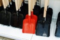 Metal shovels for excavation and construction work in a shop window. Trade in working instruments in the trading network. Close-up