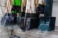 Metal shovels of various types and sizes on the shop counter. Trade in tools for earthworks. Close-up Royalty Free Stock Photo