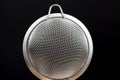 metal sieve with small cells Royalty Free Stock Photo