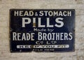 Retro metal advertising sign. Head & Stomach Pills.