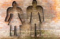 Metal silhouette sign of a man and woman Royalty Free Stock Photo