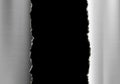 Metal silver torn plate with a black hole Royalty Free Stock Photo