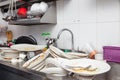 Metal sink full of dirty dishes, crockery, tableware Royalty Free Stock Photo