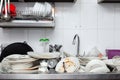 Metal sink full of dirty dishes, crockery, tableware Royalty Free Stock Photo