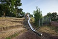 Metal slide installed on the children playground in the Prater park. Vienna Austria Royalty Free Stock Photo