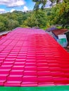 Metal spanish tile roof system. Corrugated metal sheet made of painted steel Royalty Free Stock Photo