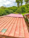 Metal spanish tile roof system. Corrugated metal sheet made of painted steel Royalty Free Stock Photo