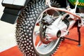 Metal spikes on motorcycle wheel