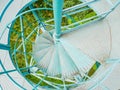 Metal spiral staircase leading the lookout tower. Perforated stairs Royalty Free Stock Photo