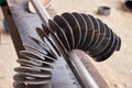 metal spiral before winding on the shaft for auger manufacturing