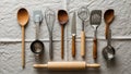 And metal spoons whisks measuring cups a spatula a knife and a rolling Royalty Free Stock Photo