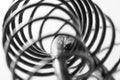 Metal spring coiled, black and white macro shot