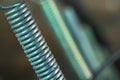 Metal springs standing in a row on the soil-processing unit Royalty Free Stock Photo