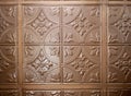 Metal squared design pattern ceiling tile painted brown