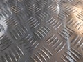 Metal stainless steel sheet with notches. Silver colored metal