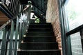 Metal stairs in the coffee shop, interior or modern concept. Royalty Free Stock Photo