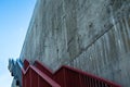 Metal stairs on the gray concrete wall Royalty Free Stock Photo