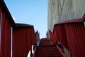 Metal stairs on the gray concrete wall Royalty Free Stock Photo