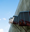 Metal stairs on the gray concrete wall Royalty Free Stock Photo