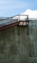 Metal stairs on the gray concrete wall Royalty Free Stock Photo