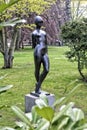 Metal statue of the naked girl in the park