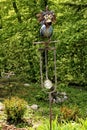 Metal statue of the parrot with glass sphere Royalty Free Stock Photo