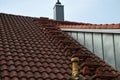 Metal steps on a roof leading to chimney Royalty Free Stock Photo