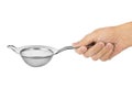 Metal strainer in hand Royalty Free Stock Photo