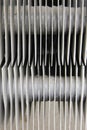 Metal strips on the old radiator grille of the battery Royalty Free Stock Photo