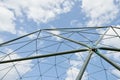 Metal structure against the blue sky. Royalty Free Stock Photo