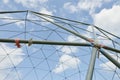 Metal structure against the blue sky. Royalty Free Stock Photo