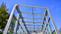 Modern building glass roof metal frame construction. Royalty Free Stock Photo