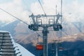 Metal support of the cable car in the mountains. Lift at the ski resort.