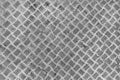 Metal surface with diamond plate texture. The diamond steel metal sheet. Pattern of old metal diamond plate. Industrial light Royalty Free Stock Photo