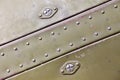 Metal surface with rivets Royalty Free Stock Photo